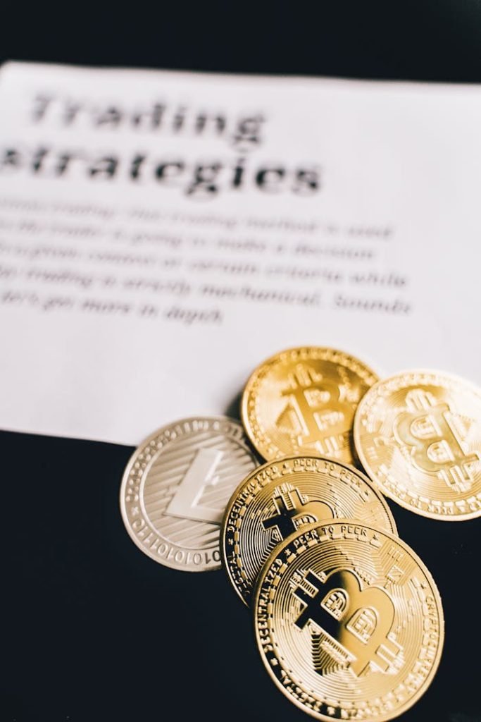 How to Create a Beginner-Friendly Budget 11 Close-up of Bitcoin and Litecoin coins on a trading strategies document.
